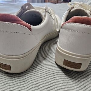 White Sneakers with Red Accents